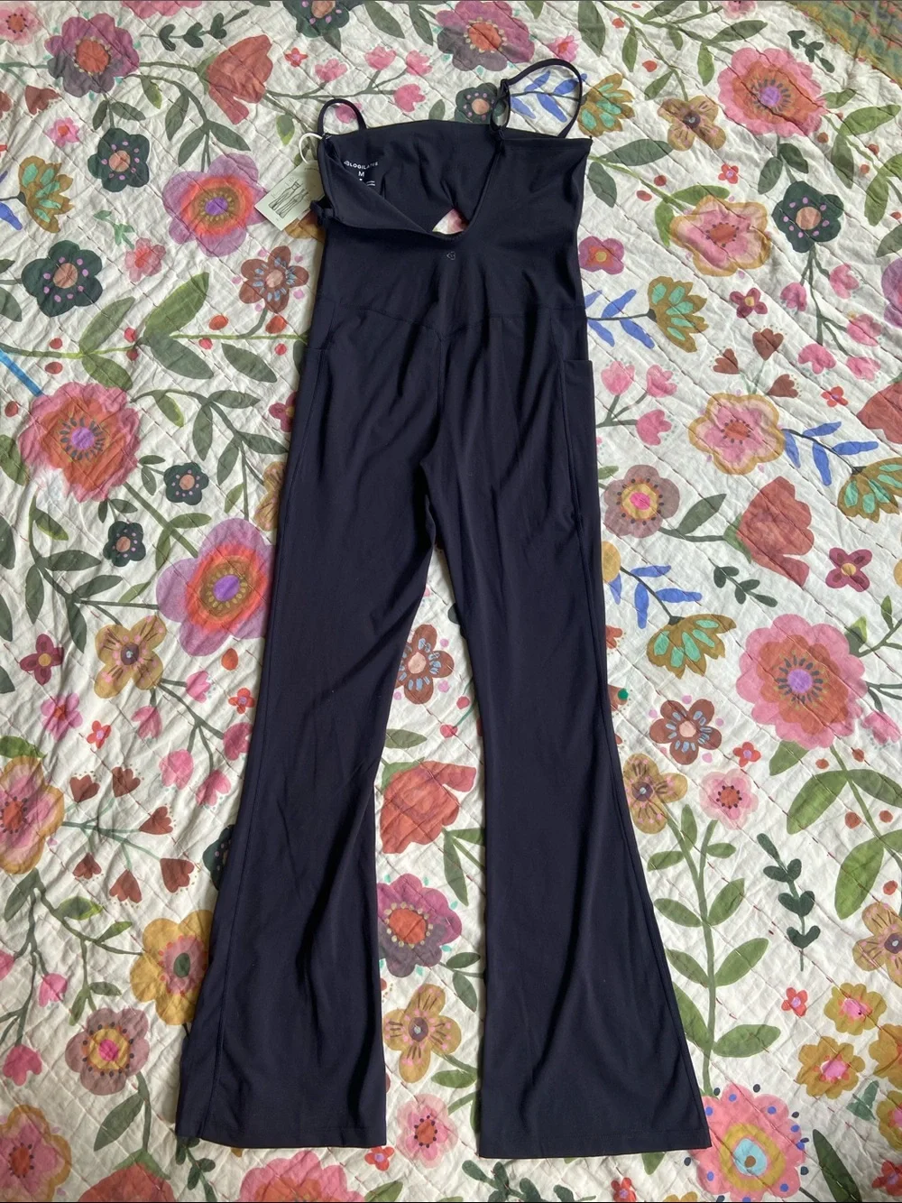 Logilates NWT Black Peekaboo Onsie Flare Leg Jumpsuit M